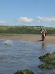 SX07946 Wouko skipping stone on Ogmore River.jpg